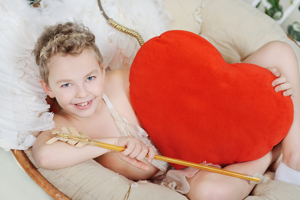 baby cupid with heart - Foto, afbeelding
