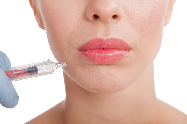 close up botox shot in the female lips - Фото, изображение