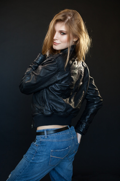 beautiful sensual sexy girl blonde in a leather jacket   - Zdjęcie, obraz