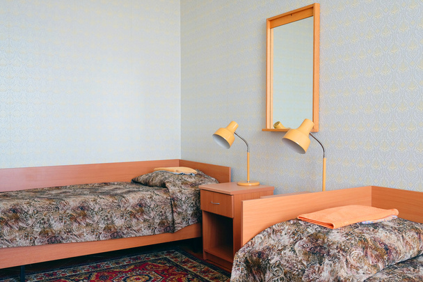 Łóżka w pokoju - Zdjęcie, obraz