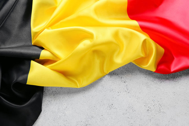 Flaga Belgii na jasnym tle - Zdjęcie, obraz