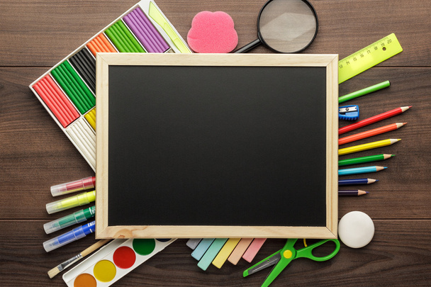 school supplies and blackboard - Фото, зображення