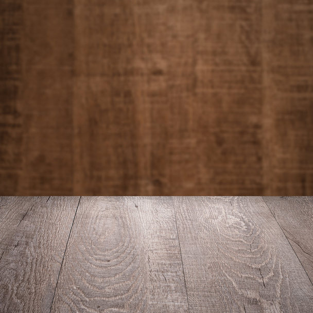 Table with wooden wall - Φωτογραφία, εικόνα