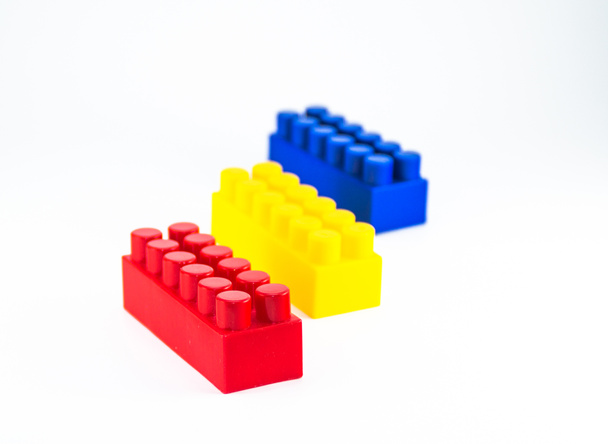 Colorful plastic toy blocks - Фото, изображение