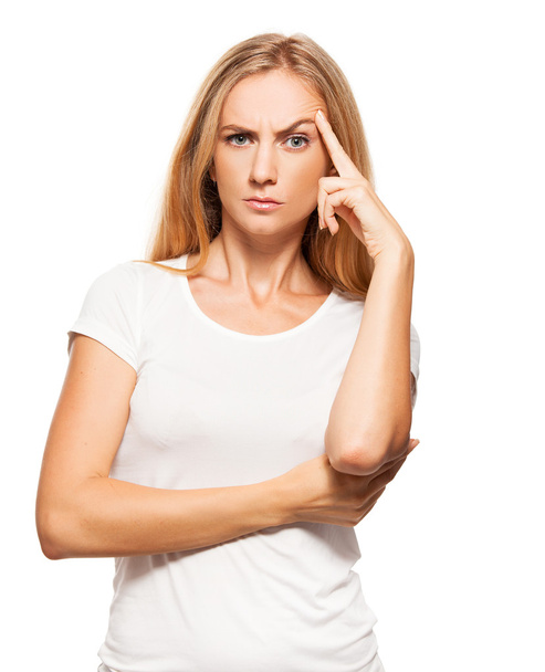 Thinking angry female on white - Фото, изображение