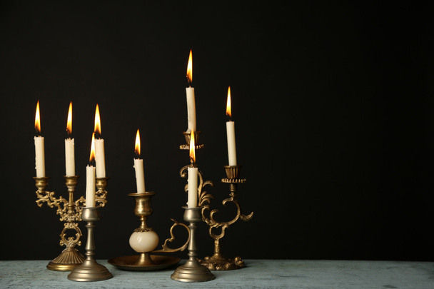 Retro candlesticks with candles - Foto, afbeelding