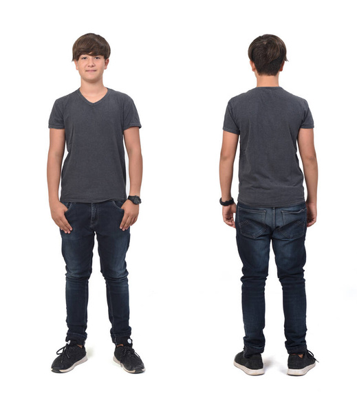 front  and back view of a same teenage boy standing on white background, - Photo, Image