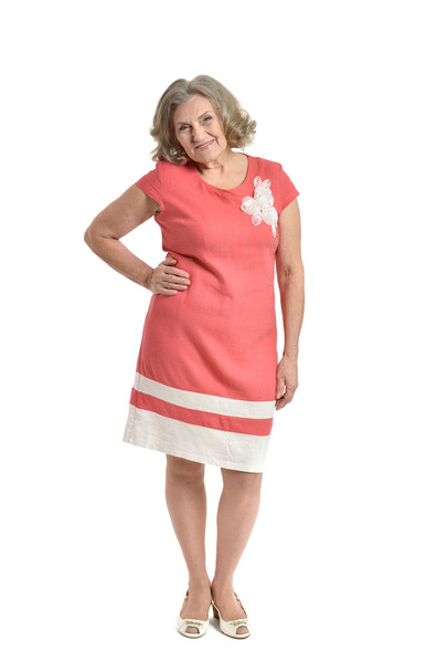 Senior woman in red dress - Foto, afbeelding