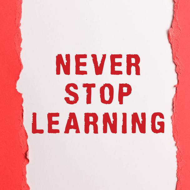 手書きテキスト｜Never Stop Learning, Business Concept(学習を止めない、ビジネスコンセプト)境界を改善し、強化し続ける - 写真・画像