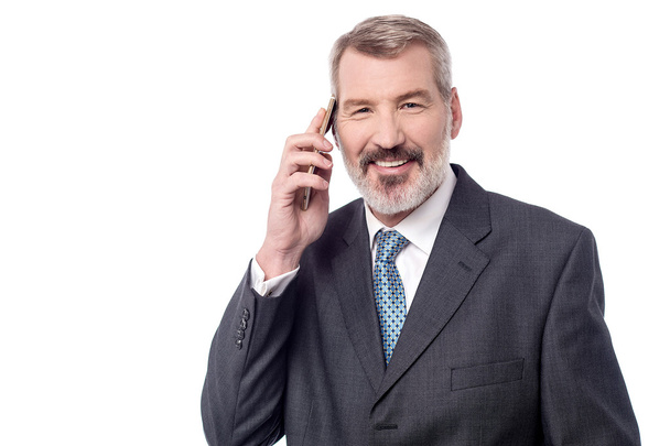 Businessman talking on cell phone - Foto, Imagem