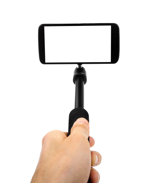 Λήψη selfie - λαβή monopod με κινητό τηλέφωνο - Φωτογραφία, εικόνα
