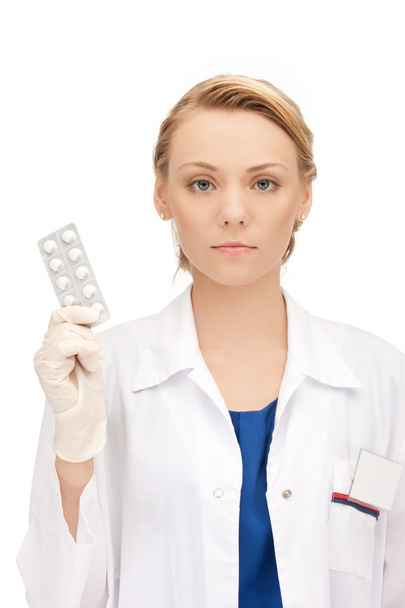 Attractive female doctor with pills - Foto, Imagem