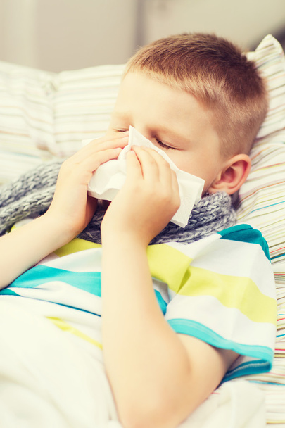 ill boy with flu at home - 写真・画像