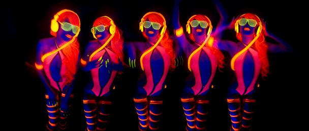 Sexy neon uv glow dancer - Photo, Image