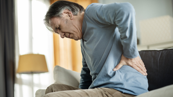 Old man suffering from back painOld man suffering from back pain - Photo, Image