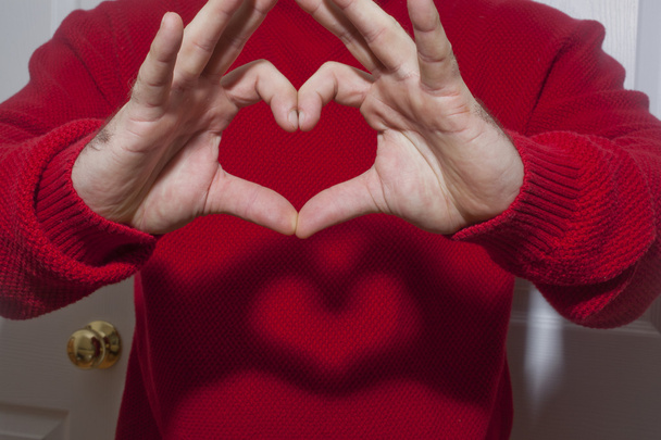Símbolo de mano en forma de corazón
 - Foto, Imagen