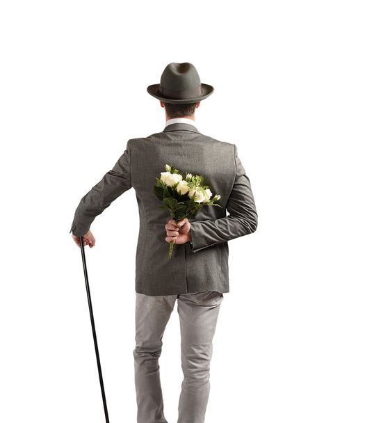 Gentleman with white roses - Foto, afbeelding