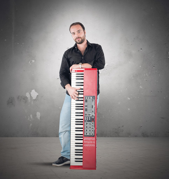 Musiker und sein Klavier - Foto, Bild
