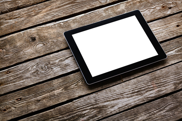 Digital tablet on old wooden desk - Foto, Imagem