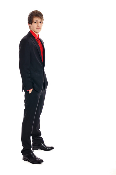 Young businessman standing - 写真・画像