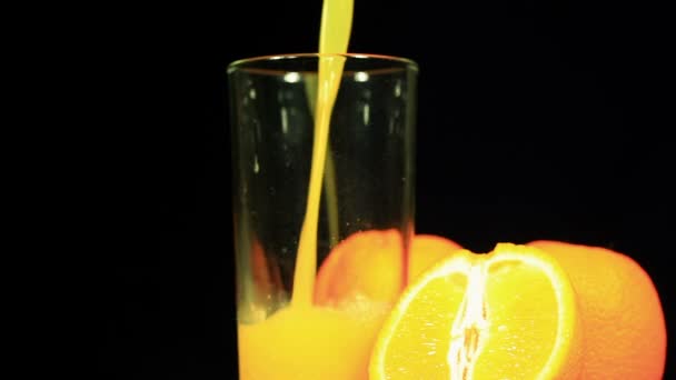 Χυμοί και φρούτα πορτοκαλιού - Πλάνα, βίντεο