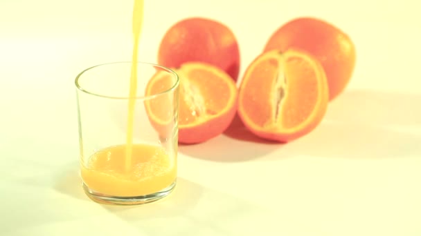 Glass with orange juice - Footage, Video