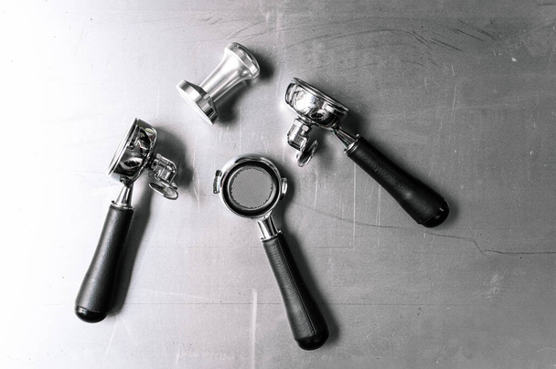 Coffee maker filter holder on metal, barista tools - Photo, Image