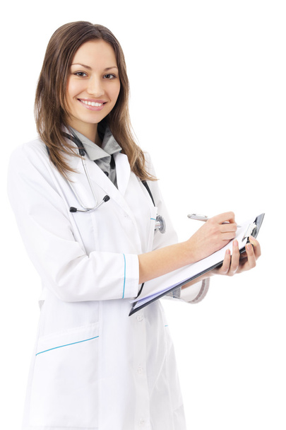 Happy female doctor writing on clipboard, isolated on white - Zdjęcie, obraz