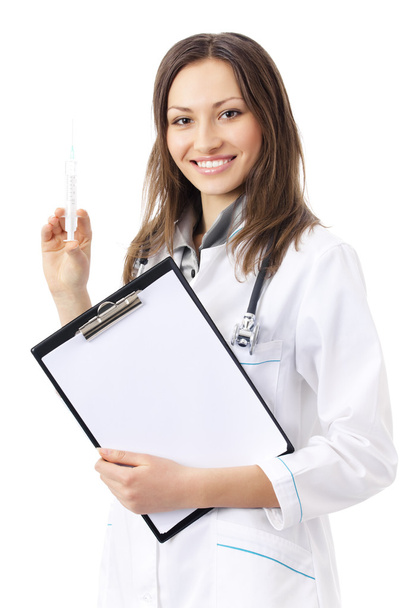 Female doctor or nurse with syringe and clipboard, isolated on w - Фото, изображение