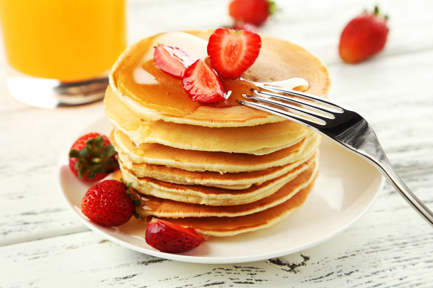 Delicious pancakes with strawberries - Fotó, kép