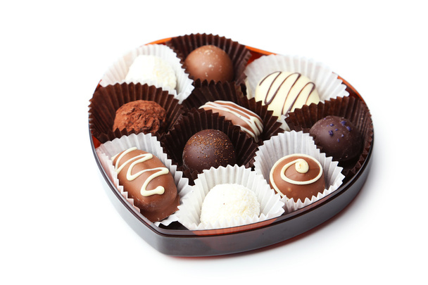 Sweet chocolates isolated on white - Foto, Bild