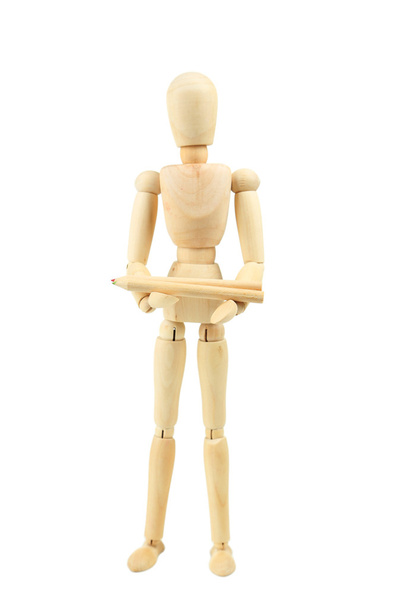 Wooden figure with pencil - Foto, immagini