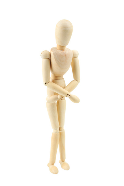 Wooden figure with stomach ache - Foto, Imagen