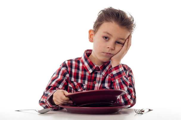 fáradt fiú étkező asztal - Fotó, kép