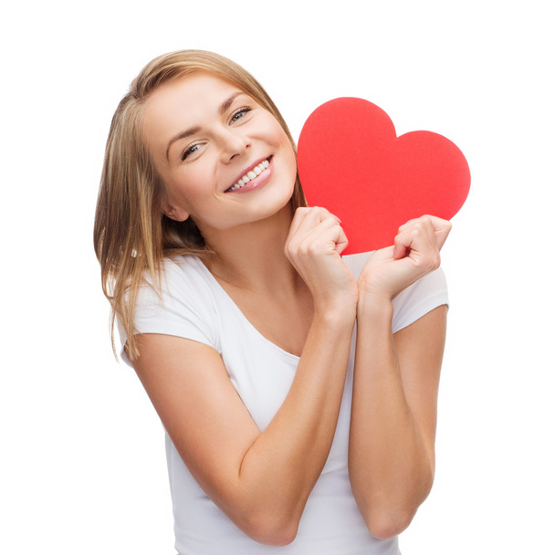 smiling woman in white t-shirt with heart - Photo, Image