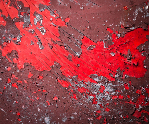 Red damaged peeled paint - Foto, Bild