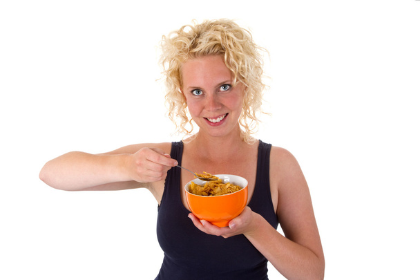 Young woman with cornflakes - Photo, Image