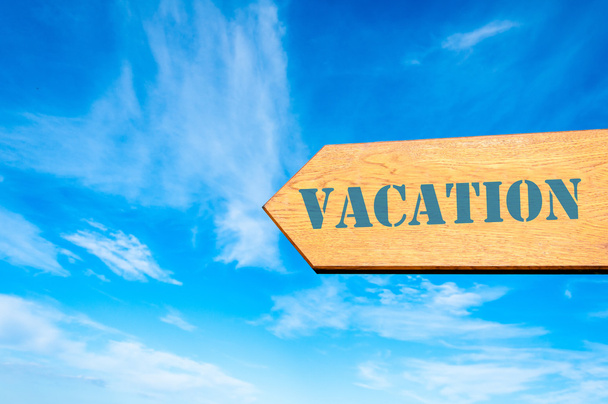 Arrow sign with Vacation message - Photo, Image