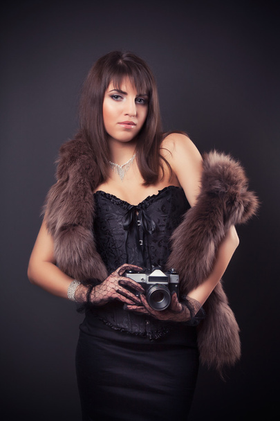 Woman holding vintage camera - Foto, Imagem