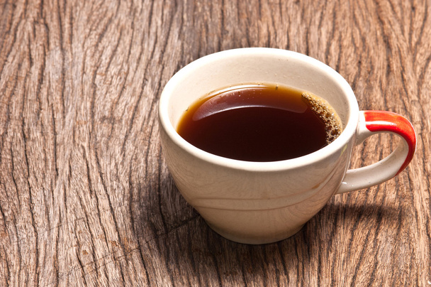 A cup of coffee on wood background - Фото, зображення