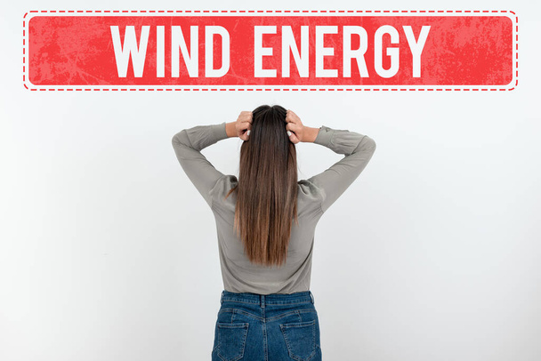 Konzeptionelle Bildunterschrift Windenergie, Internet Konzept der Prozess, durch den Wind zur Stromerzeugung genutzt wird - Foto, Bild