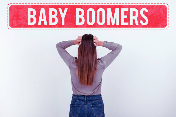 Bildunterschrift: Baby Boomers, Wort für Person, die in den Jahren nach dem Zweiten Weltkrieg geboren wurde - Foto, Bild