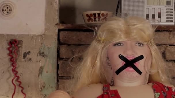 female sex puppet with crossed out mouth. High quality FullHD footage - Footage, Video