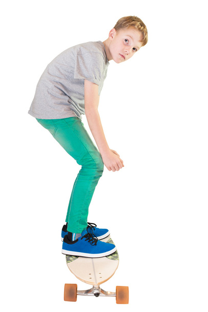 Child on his skateboard - Valokuva, kuva