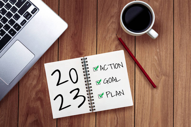 2023 Boldog Új Évet Felbontás Cél Lista és tervek beállítása - Business office desk notebook írt terv felsorolása szilveszteri célok és határozatok beállítása. Változás és meghatározás elve. - Fotó, kép