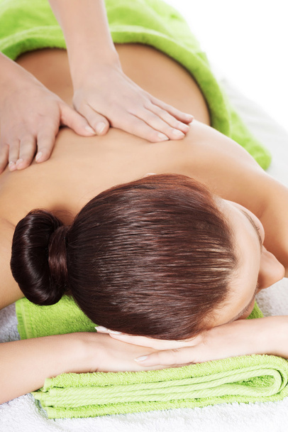 Дівчина на кам'яній терапії, масаж гарячим каменем
 - Фото, зображення
