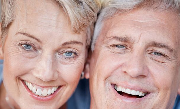 Portrait, face and senior couple with smile, retirement and happiness for romance, bonding and relationship. Romantic, mature woman and elderly man embrace, love and hug for anniversary and relax. - Photo, Image