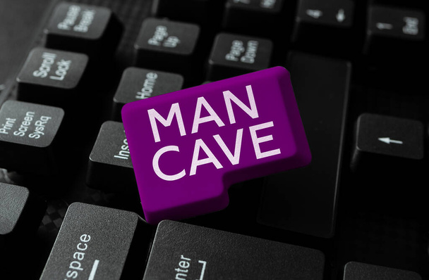Señal que muestra Man Cave, Business muestra una habitación, espacio o área de una vivienda reservada para una persona masculina - Foto, imagen