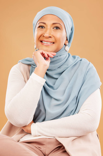 Mature muslim woman, face and fashion hijab on studio background with religion empowerment, traditional ideas or human rights innovation. Happy portrait, middle aged islamic model with Iranian scarf. - Photo, Image