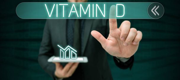 Texte manuscrit Vitamine D, Approche commerciale Nutriment responsable de l'augmentation de l'absorption intestinale - Photo, image